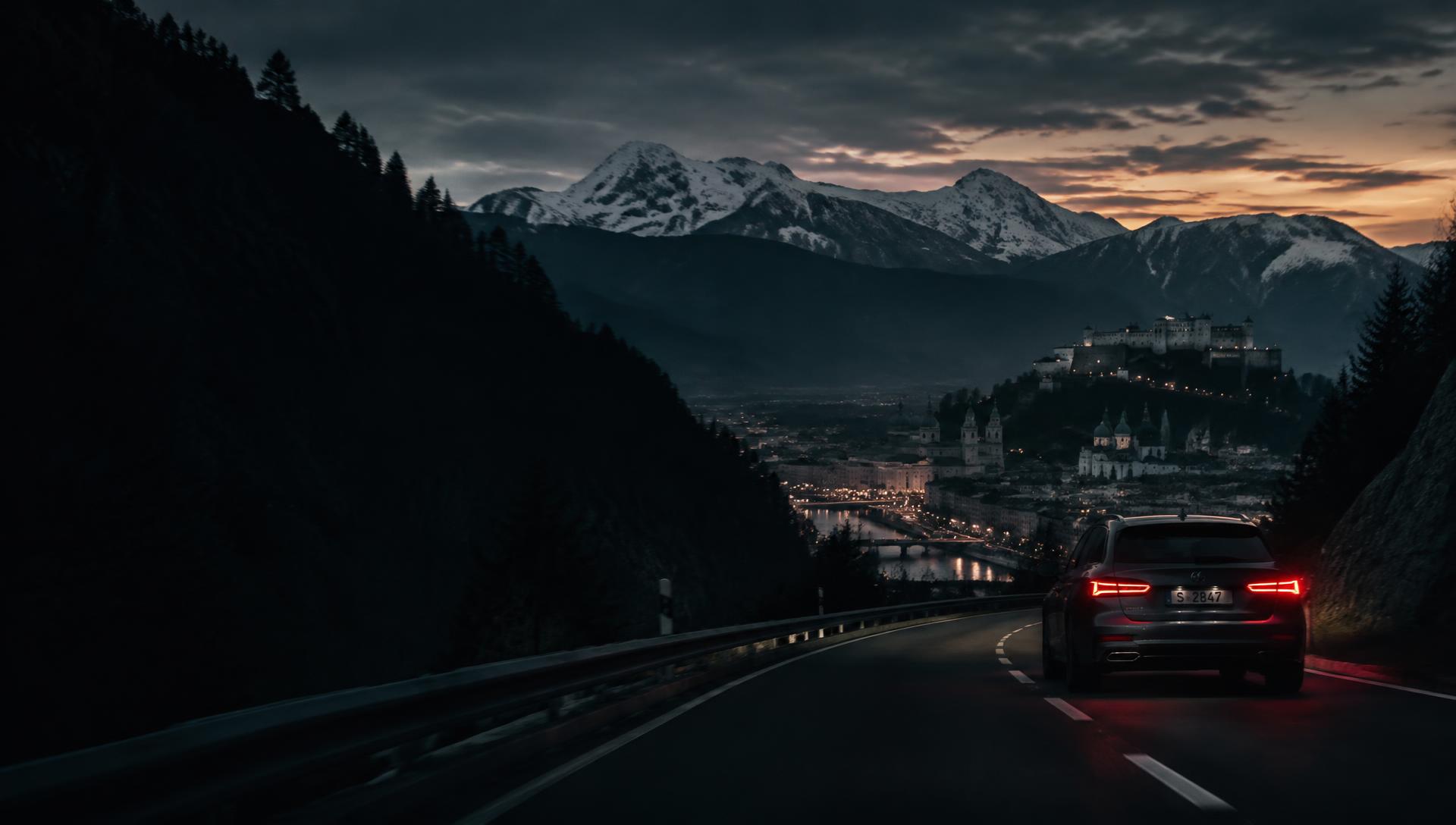 Car driving towards Salzburg at dusk